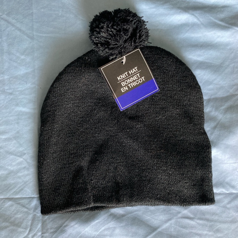Black knit bonnet beanie with pom pom